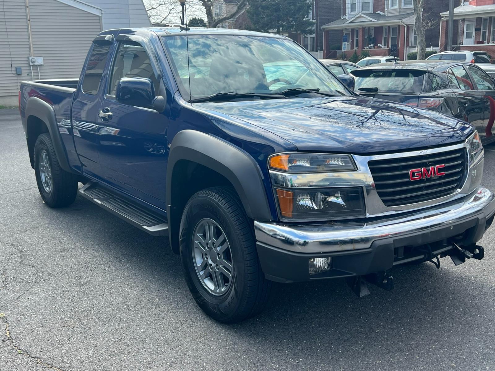 2012 Blue /gray GMC Canyon SLE Ext. Cab 4WD (1GTJ6MF98C8) with an 2.9L L4 DOHC 16V engine, located at 1018 Brunswick Ave, Trenton, NJ, 08638, (609) 989-0900, 40.240086, -74.748085 - Whether you are looking for a knock around truck for light duty errands or looking for a plow truck for your business, this GMC Canyon fits the bill perfectly! Just serviced and well maintained with low miles! Call Anthony to check it out! (609)273-5100 - Photo #1